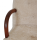 Clam chair reupholstered in sheepskin