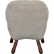 Clam chair reupholstered in sheepskin