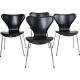 Set of four Arne Jacobsen Seven chairs in black Essential leather