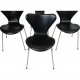 Set of four Arne Jacobsen Seven chairs in black Essential leather