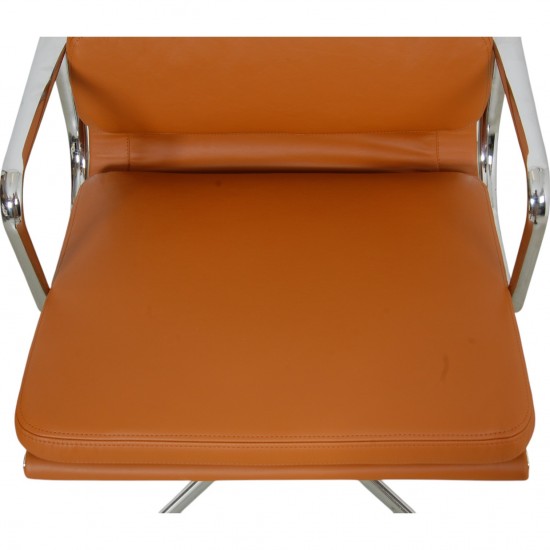 Charles Eames Ea-208 chair reupholstered in cognac Nevada anilin leather