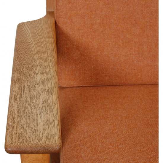 Hans Wegner GE-290a lounge chair in orange fabric