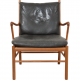 Ole Wanscher Colonial chair in black leather and walnut